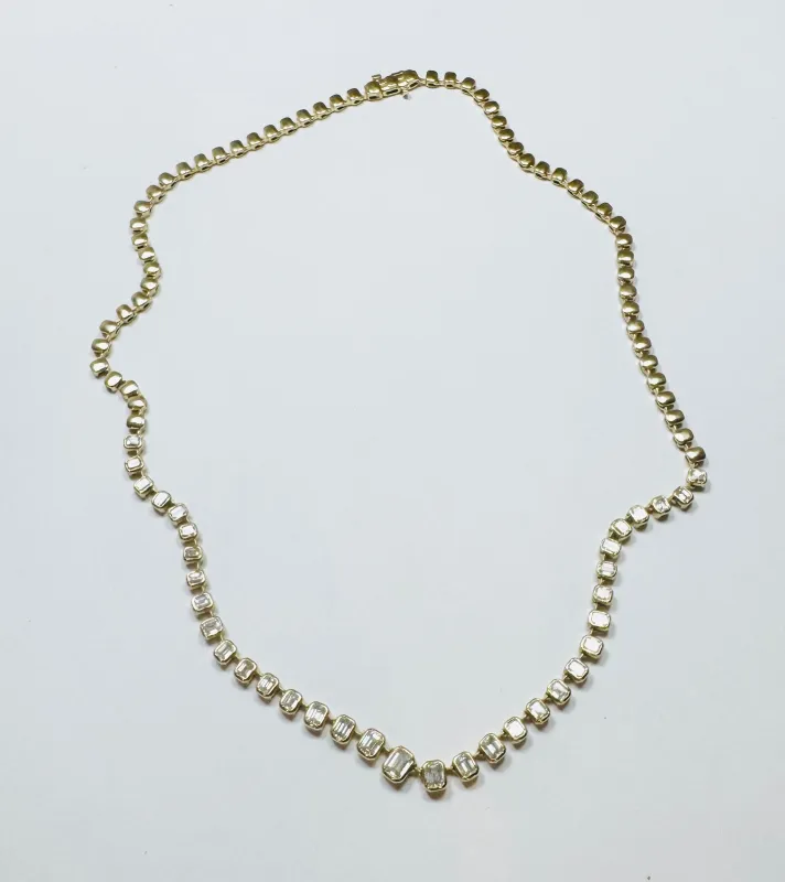 bezel set emerald cut diamond tennis necklace sold by Theodosia