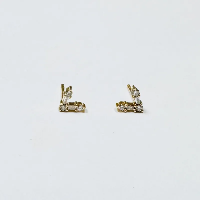 baguette “V” studs sold by Theodosia