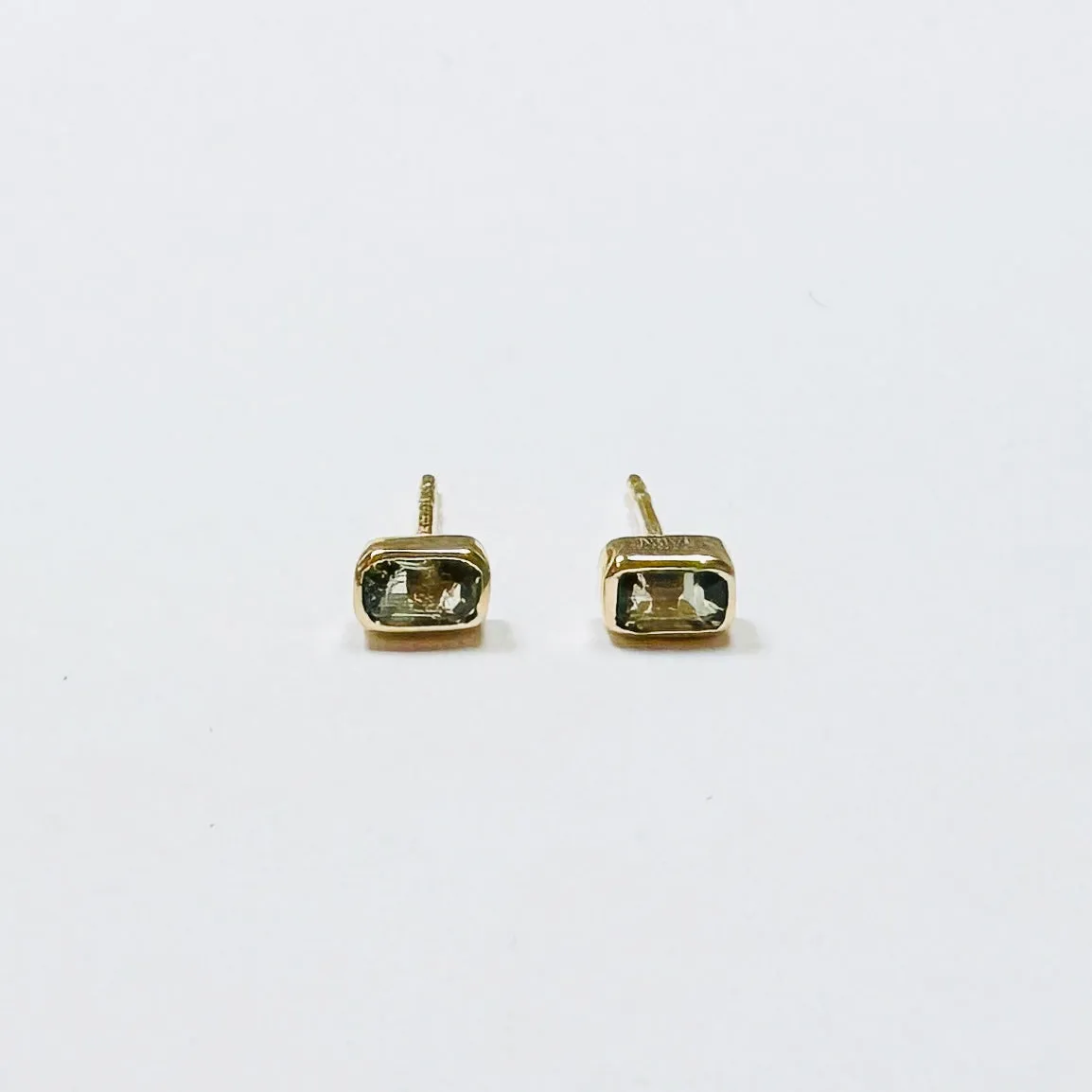 green sapphire bezel set studs sold by Theodosia