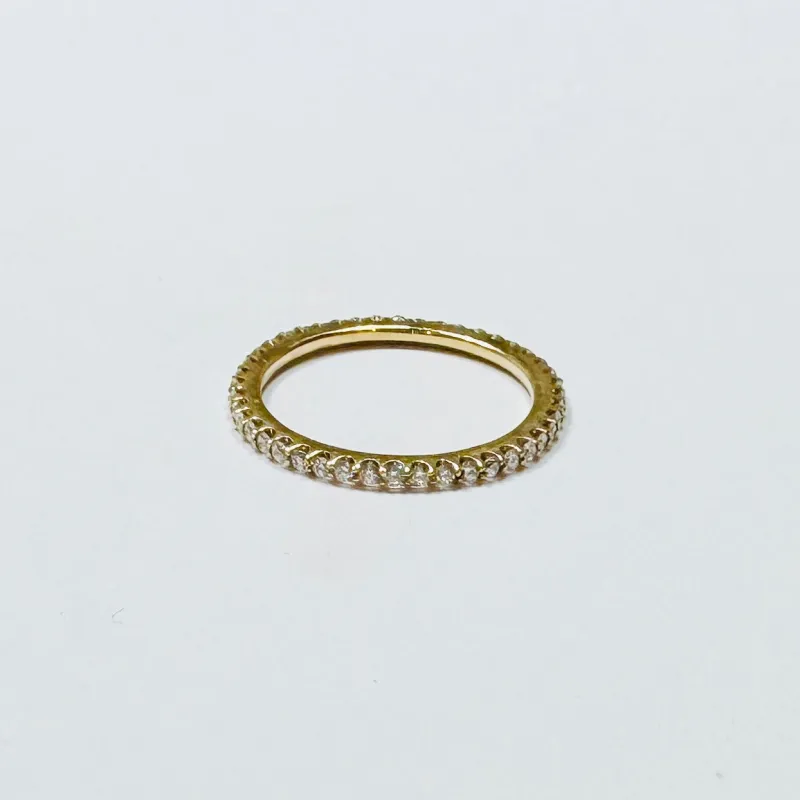 prong set diamond eternity band sold by Theodosia