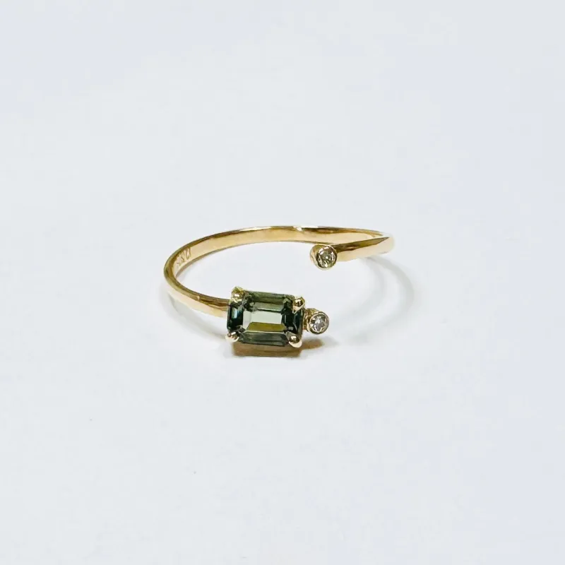 green sapphire baguette wrap ring sold by Theodosia