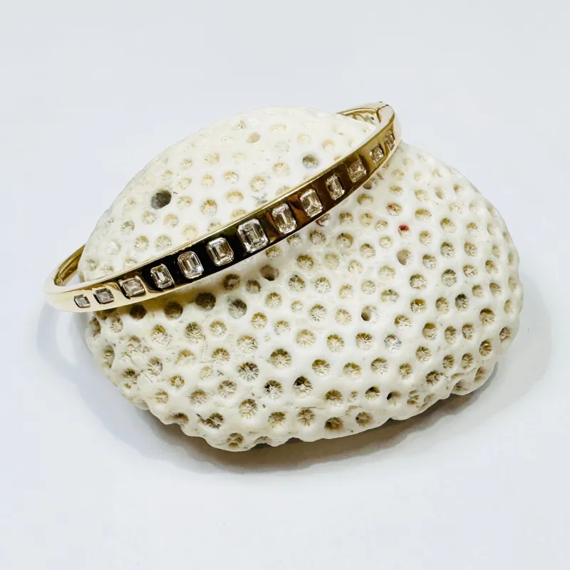 emerald cut diamond and bangle sold by Theodosia