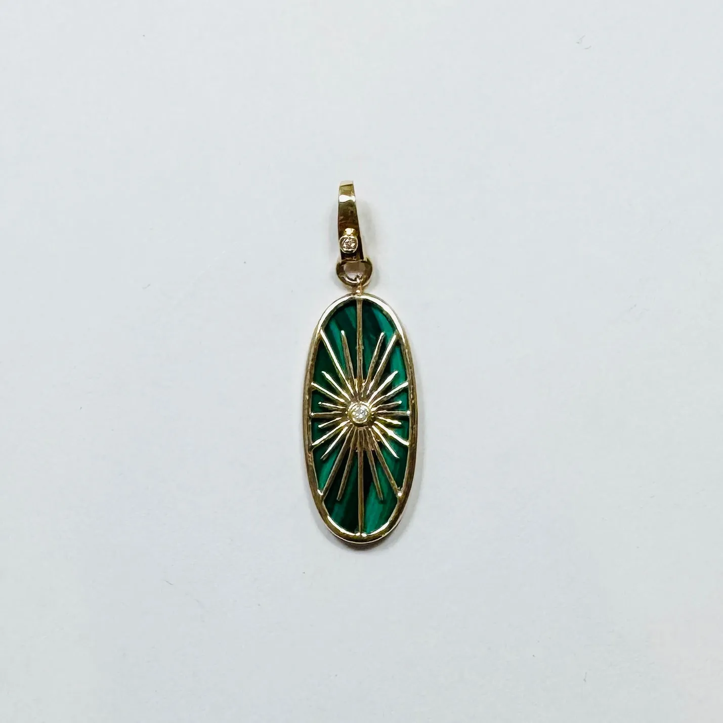 Gemstone starburst pendant sold by Theodosia
