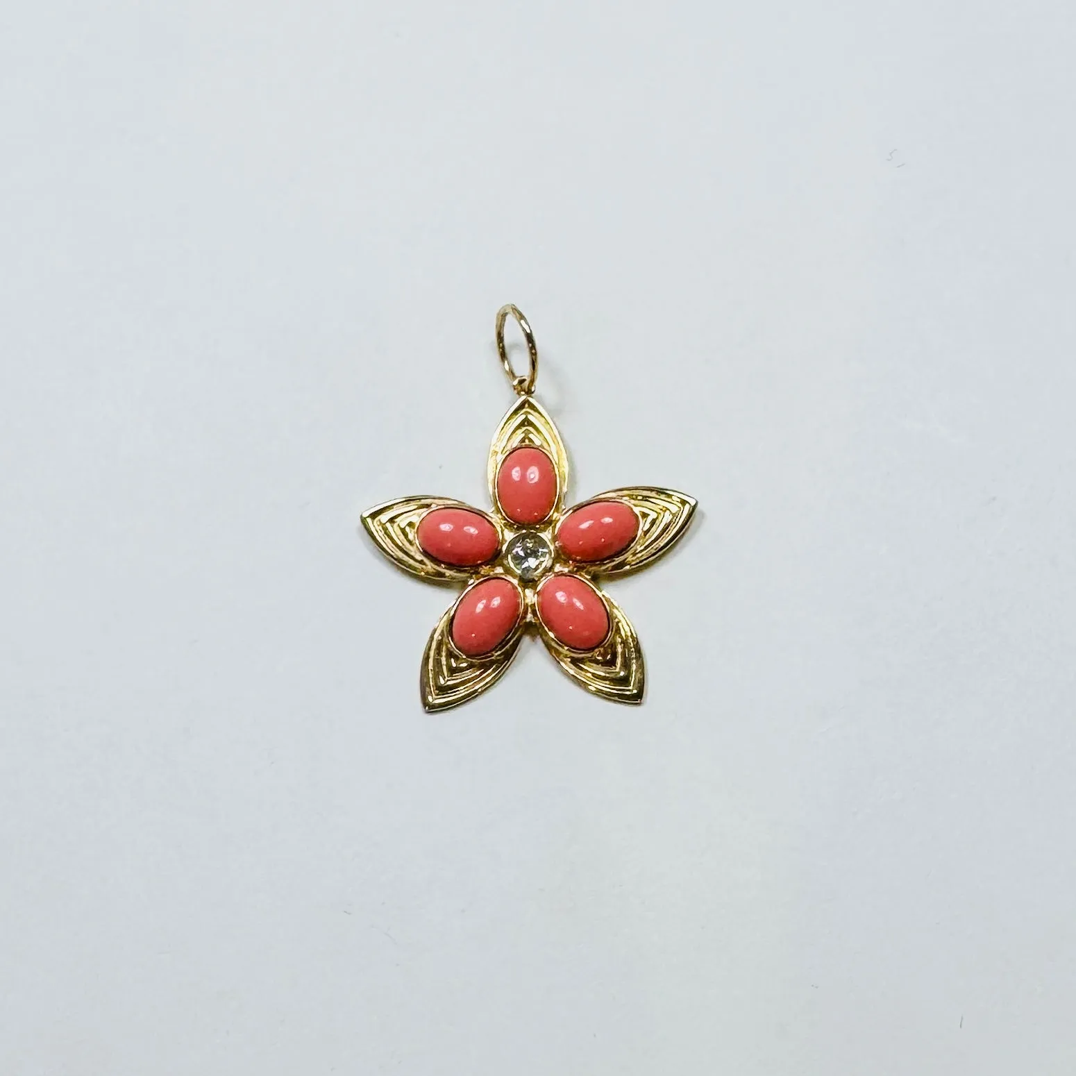 coral flower pendant sold by Theodosia