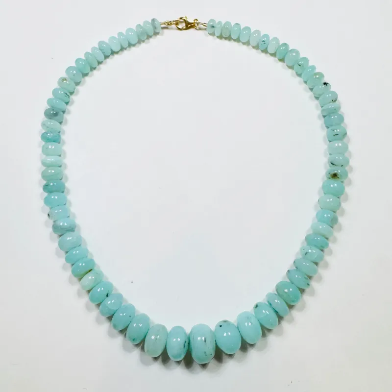 Peruvian bright blue opal graduated necklace sold by Theodosia