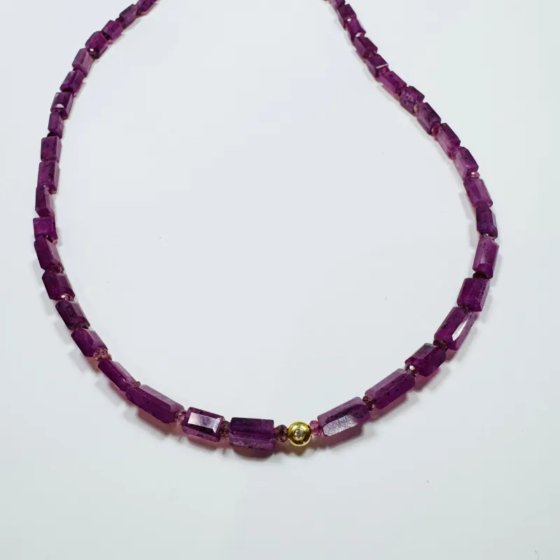 tube block ruby necklace with diamond bead sold by Theodosia