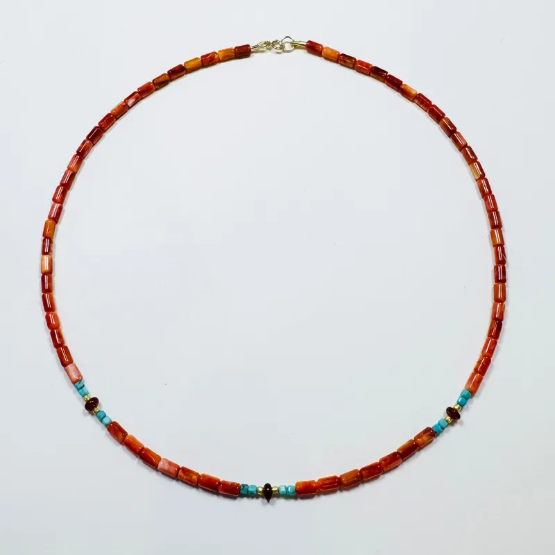 coral, turquoise, carnelian, and gold beads sold by Theodosia