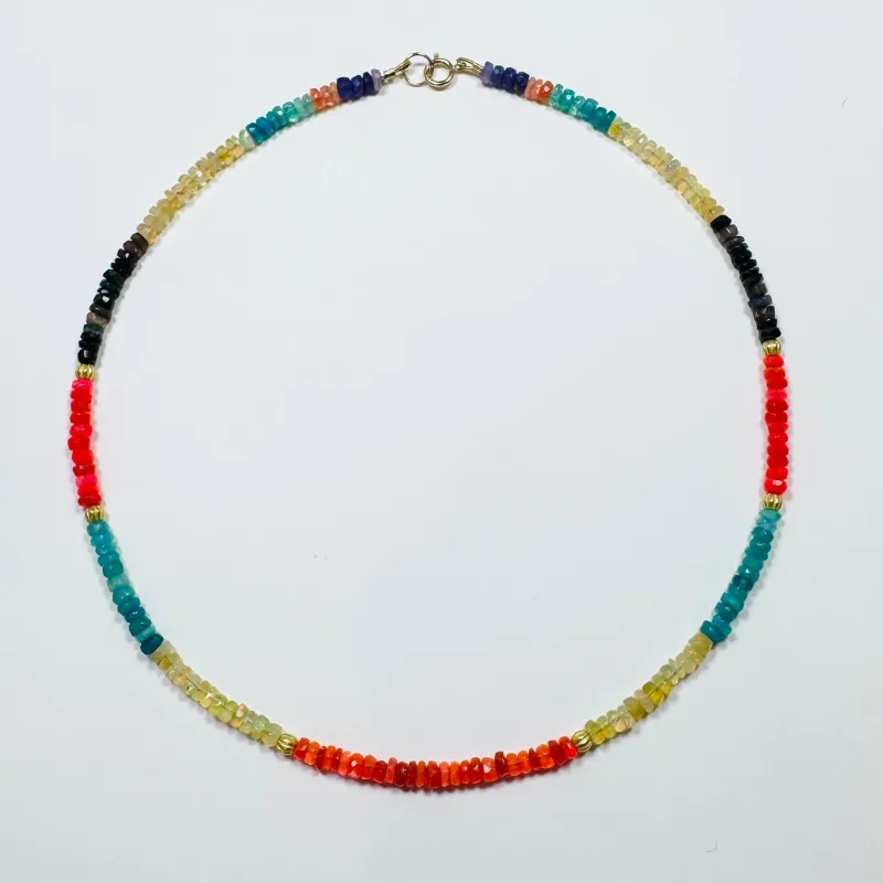 multicolored Ethiopian opal with textured gold beads sold by Theodosia