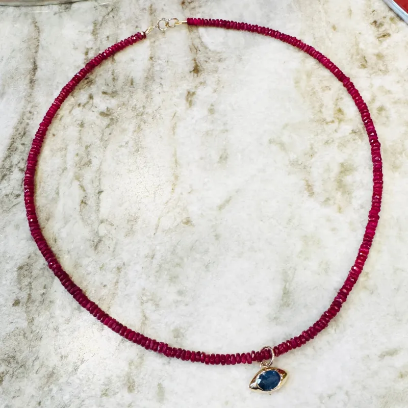 bezel set evil eye on gemstone chain sold by Theodosia