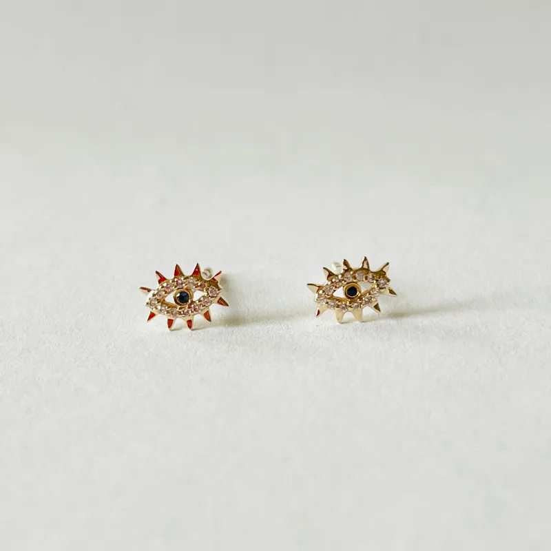 sapphire spike evil eye studs sold by Theodosia