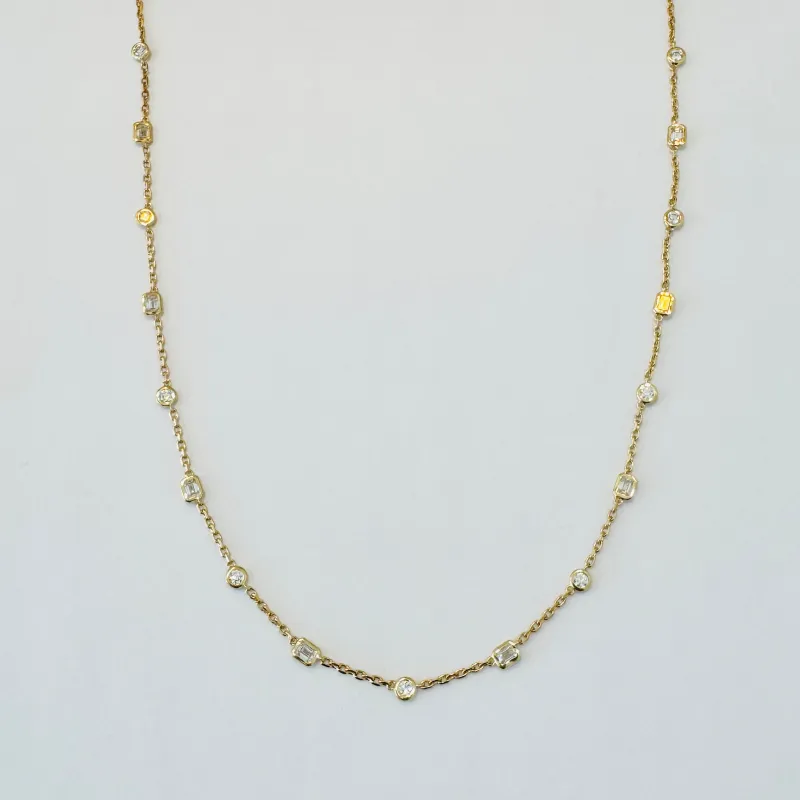 Emerald and brilliant cut diamond bezel set necklace made by Theodosia