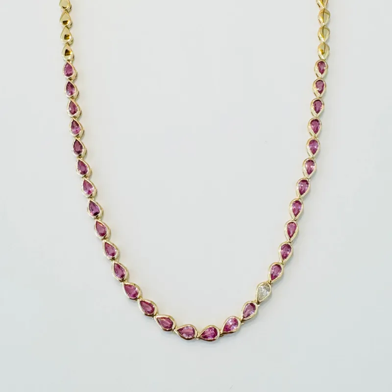 pink sapphire and diamond pear bezel necklace sold by Theodosia