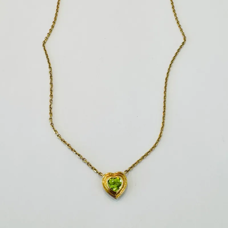 stepped bezel set heart peridot necklace sold by Theodosia