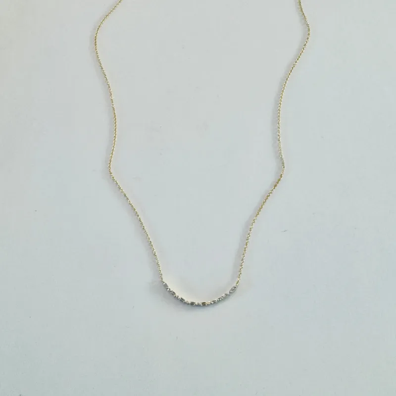 curved diamond baguette necklace made by Theodosia