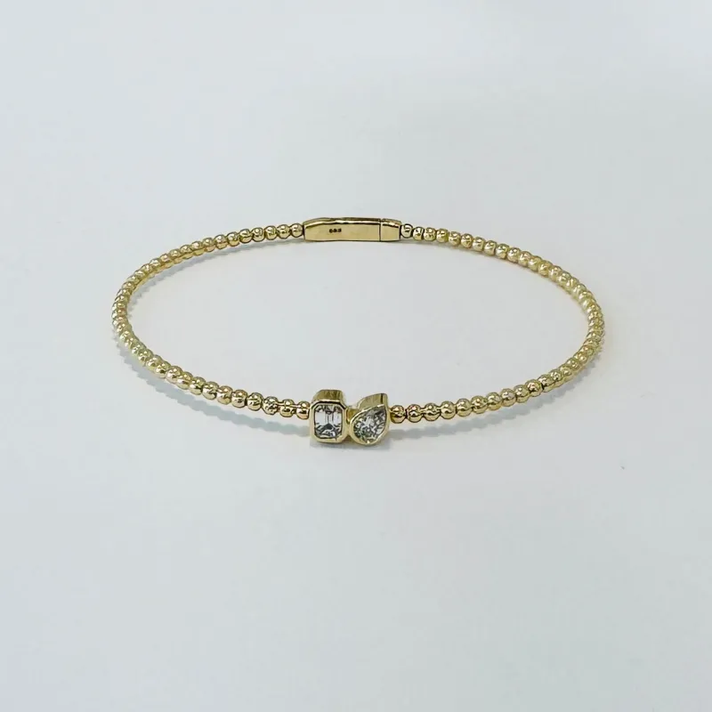 bezel set diamond bubble bangle made by Theodosia
