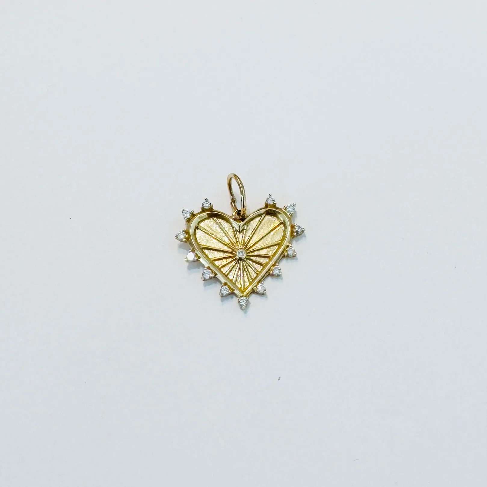 diamond spike heart pendant sold by Theodosia