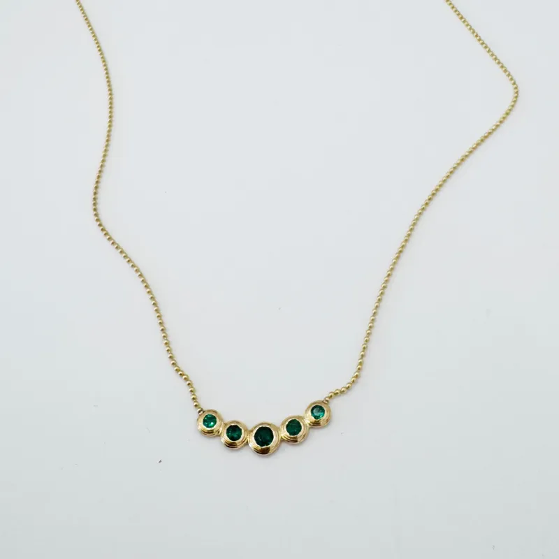 emerald bezel set necklace made by Theodosia