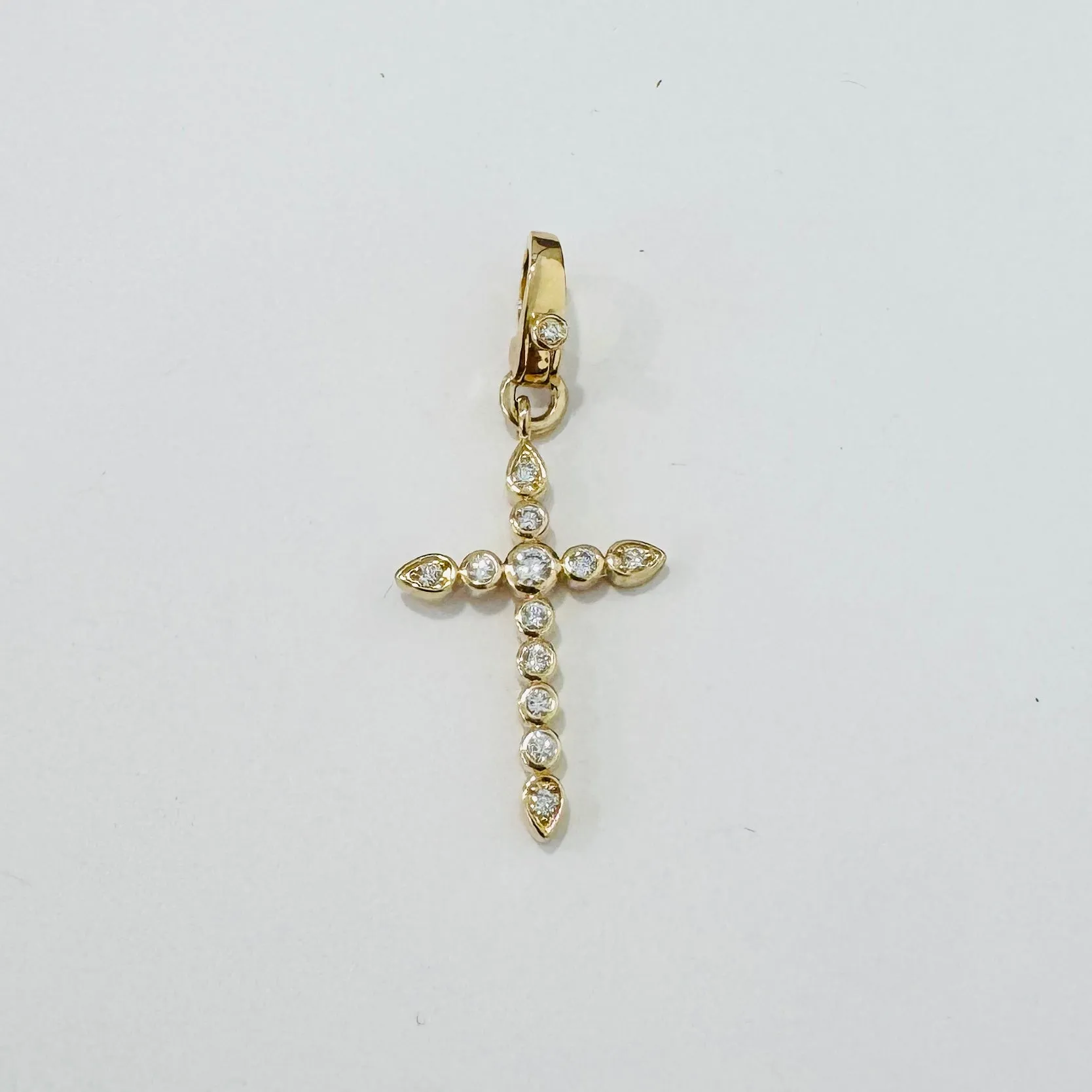 bezel set cross pendant sold by Theodosia