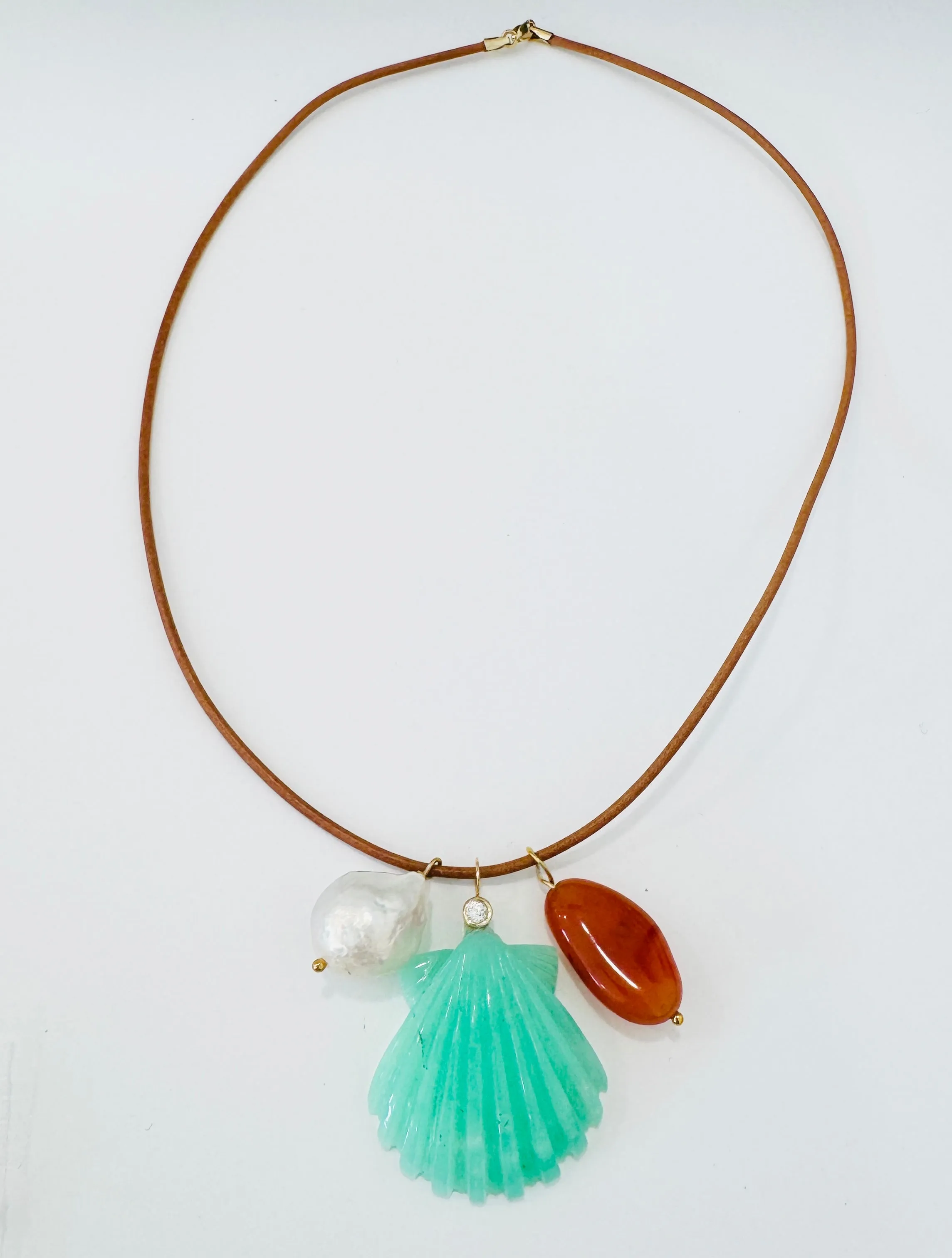 Leather cord charm necklace,chrysoprase shell with diamond bezel sold by Theodosia