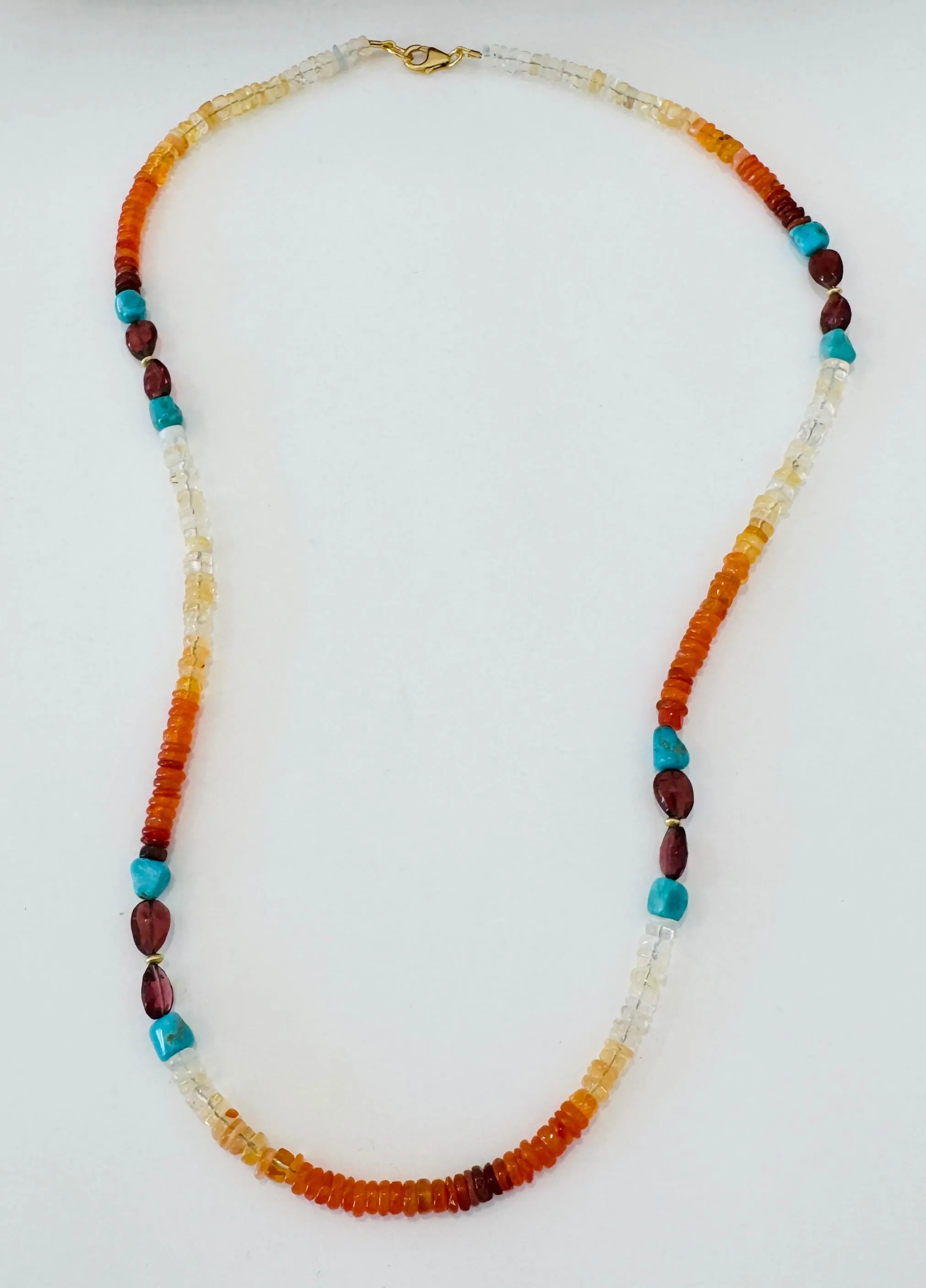 fire opal, turquoise, and garnet necklace sold by Theodosia