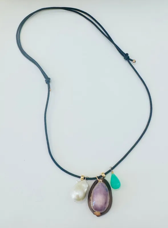 Kumihimo silk cord charm necklace, navy with pearl, chrysoprase, and purple cowrie shell made by Theodosia