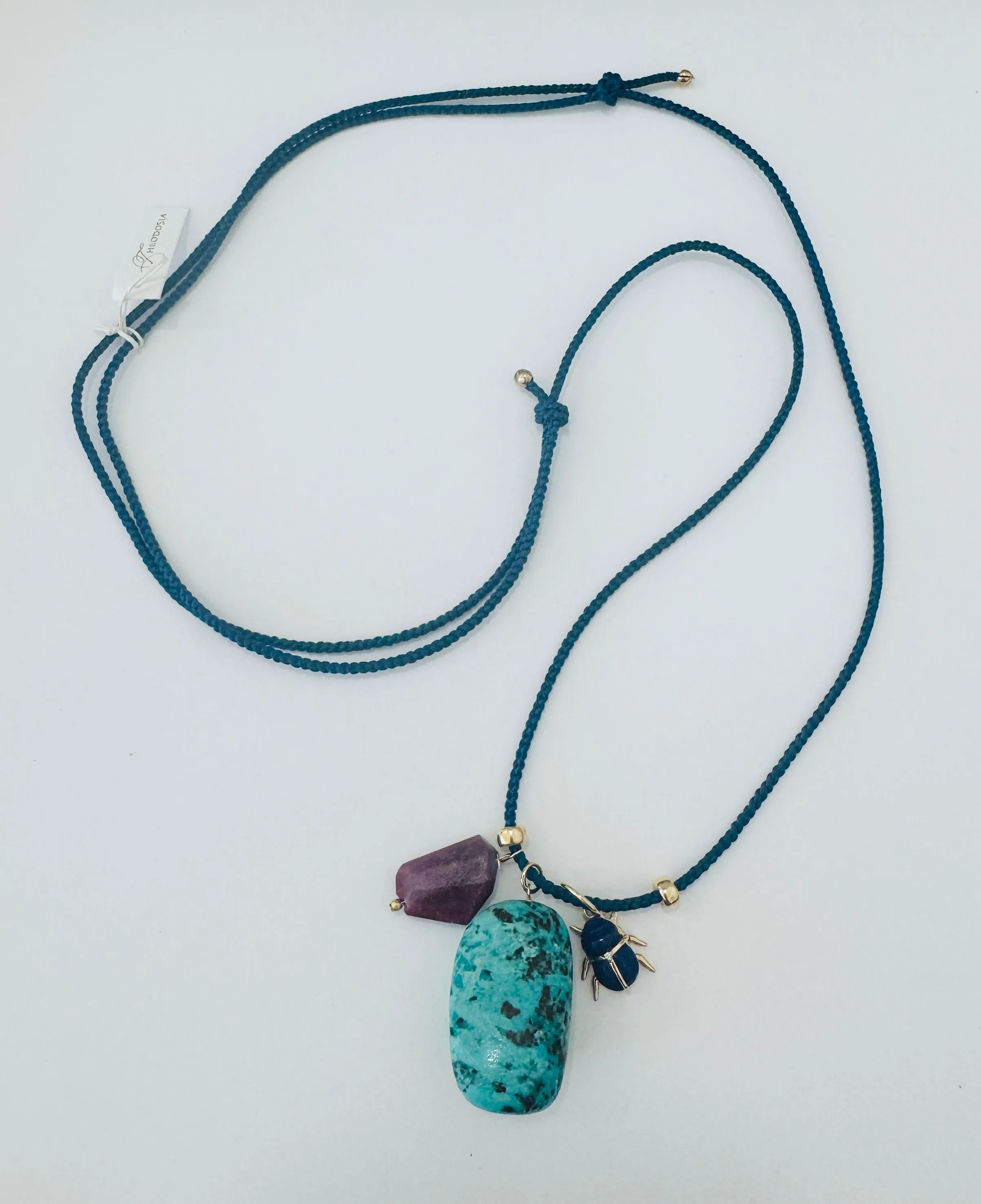 Kumihimo silk cord charm necklace, brown with chrysoprase, turquoise, and lettered olive sold by Theodosia