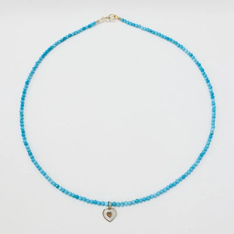 delicate gemstone necklace with mother of pearl heart charm made by Theodosia