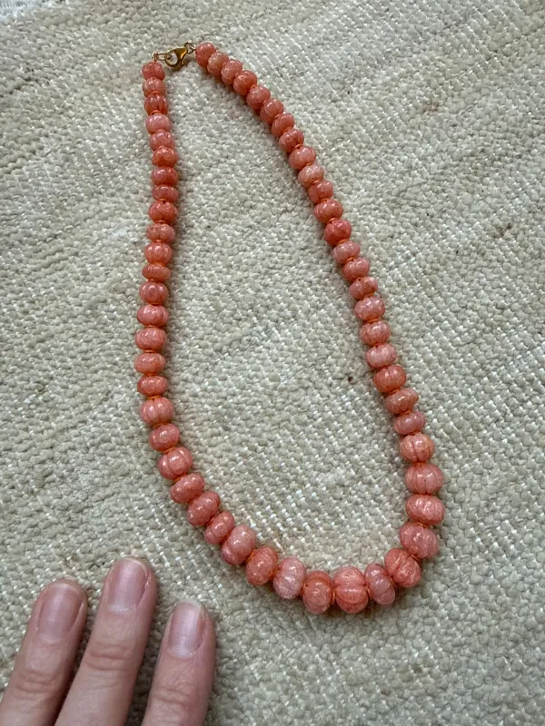 carved grapefruit candy necklace sold by Theodosia