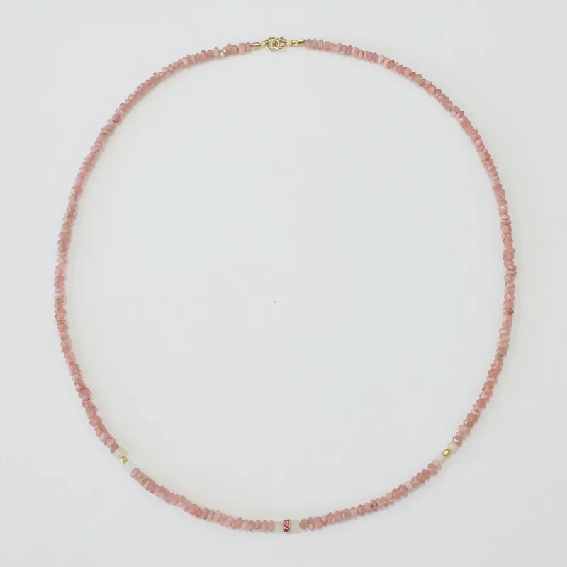 Pink sapphire bead on pink opal and rhodochrosite sold by Theodosia