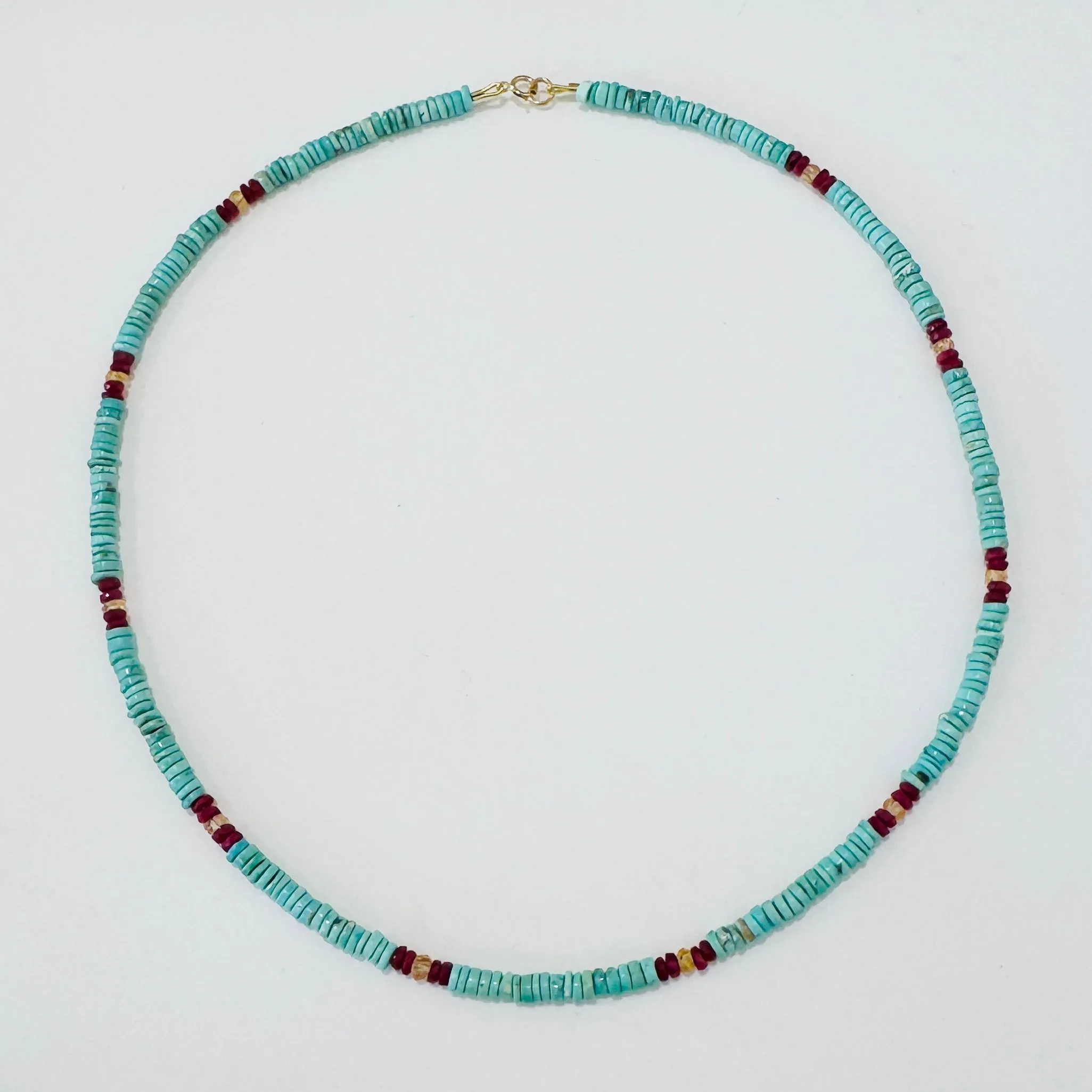 turquoise, pink tourmaline, and sapphire delicate sold by Theodosia