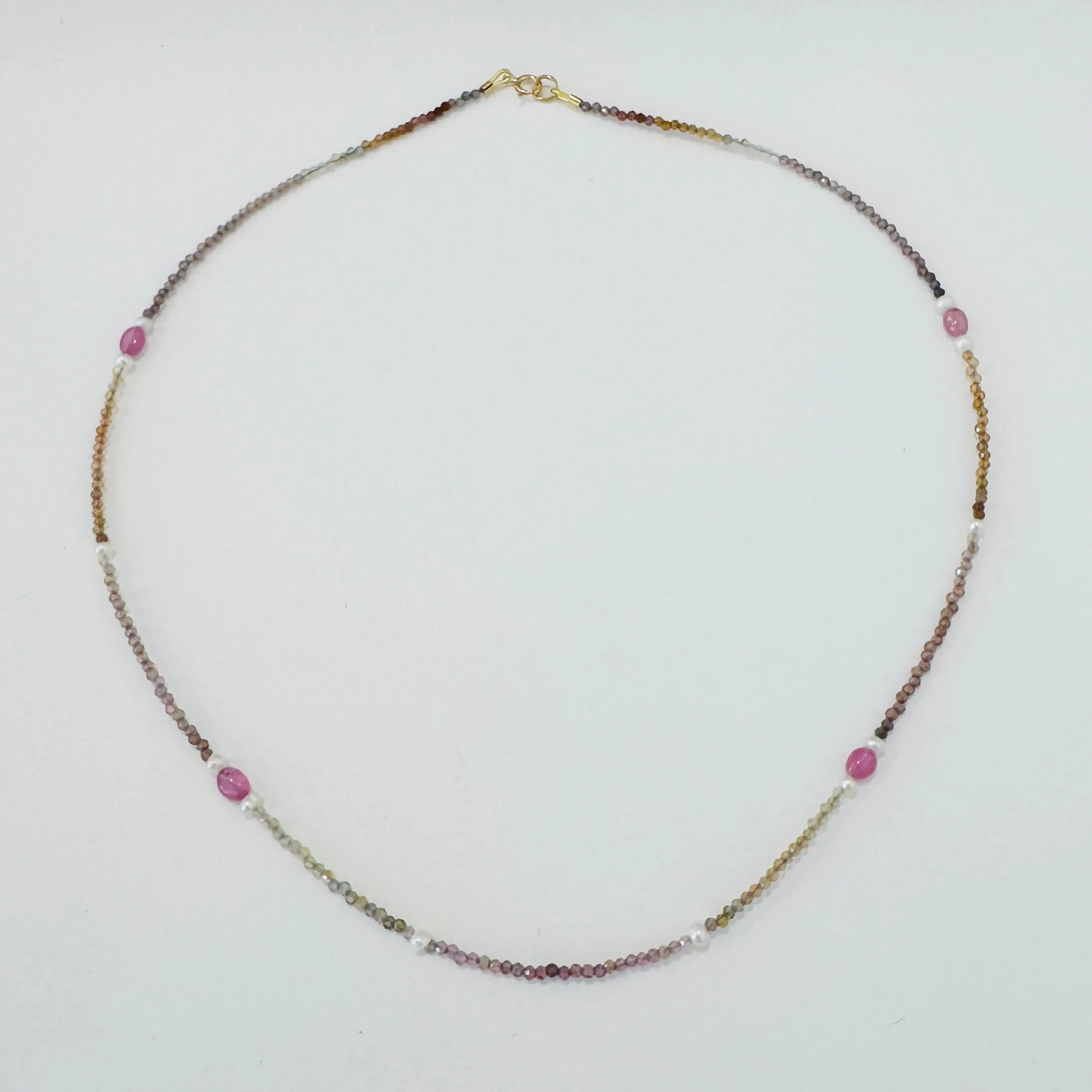 pastel sapphire, pearl, and seed bead necklace sold by Theodosia