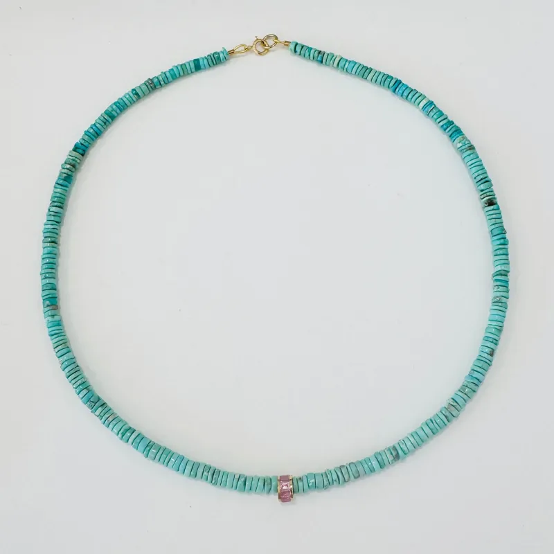 pink sapphire channel set bead on turquoise sold by Theodosia