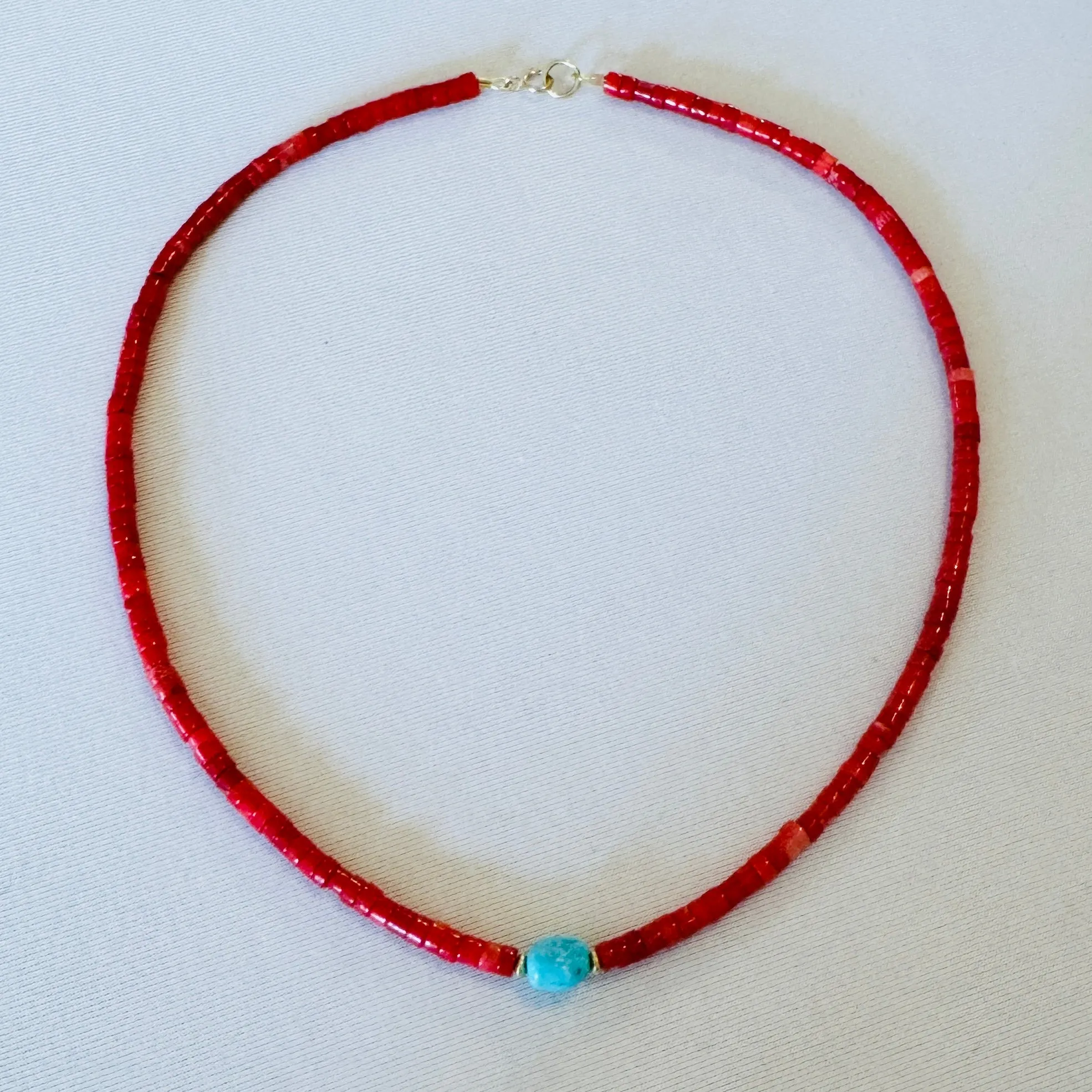 coral, turquoise, and gold beads sold by Theodosia