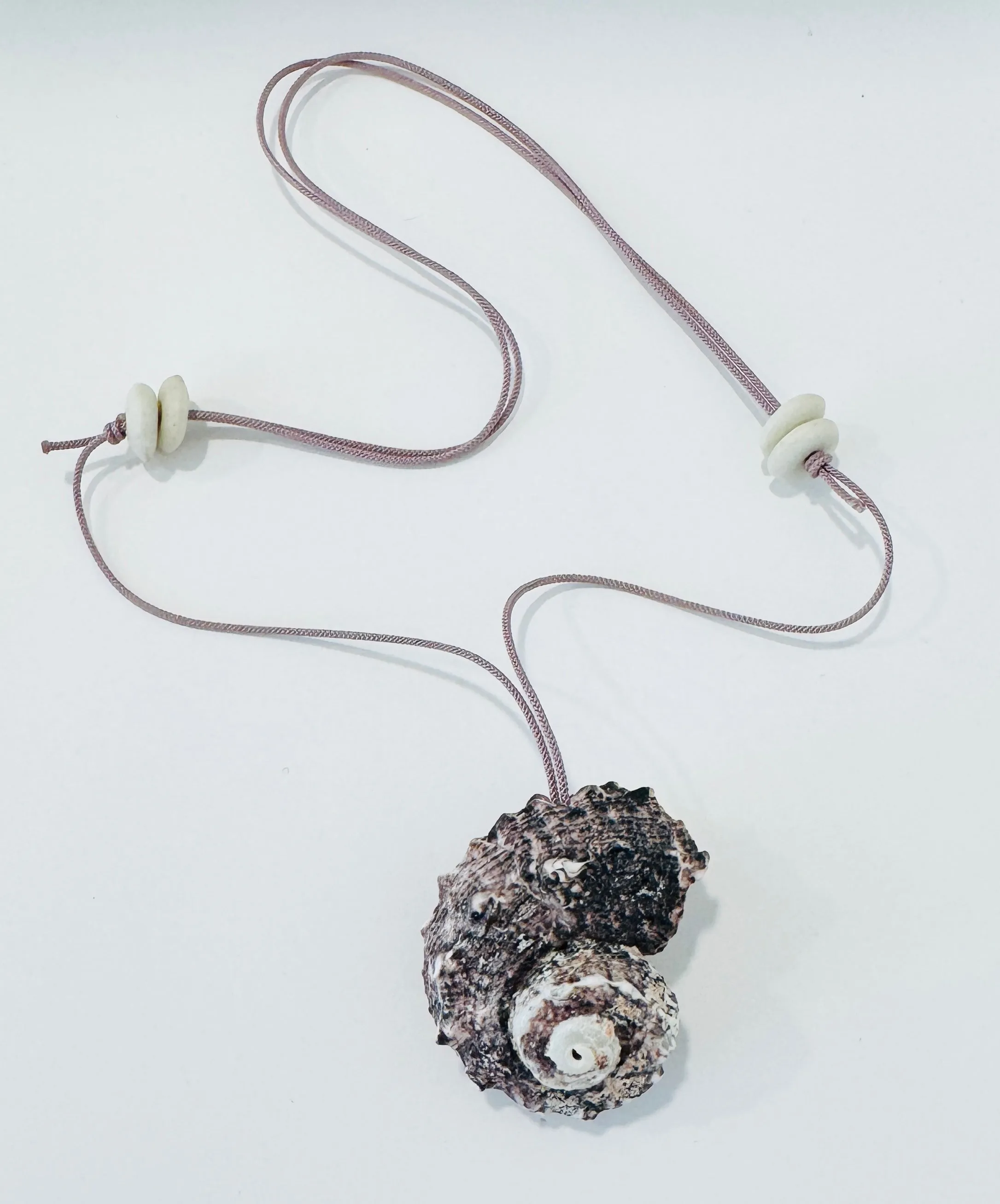 Kumihimo silk cord charm necklace, lavender with nautilus shell sold by Theodosia