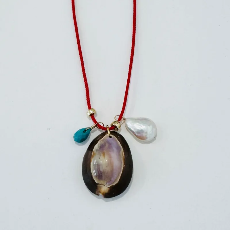 Kumihimo silk cord charm necklace, red with turquoise, pearl, and purple cowrie shell made by Theodosia
