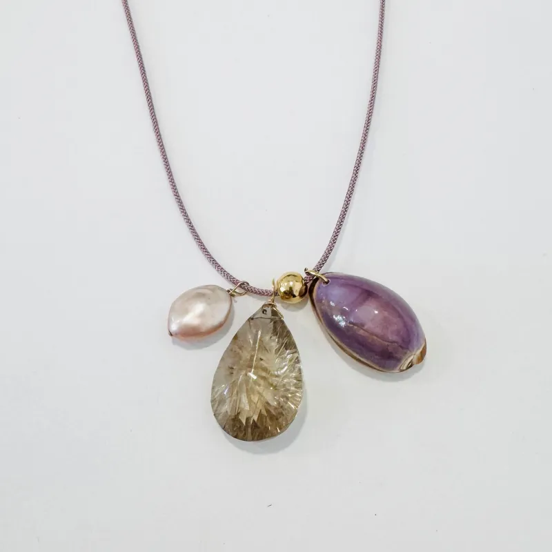 Kumihimo silk cord charm necklace, lavender with pearl, rutilated quartz, and purple cowrie shell made by Theodosia