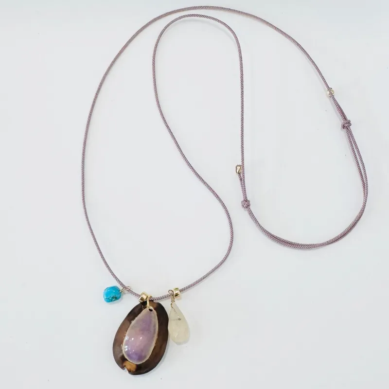 Kumihimo silk cord charm necklace, lavender with quartz, turquoise, and purple cowrie shell made by Theodosia