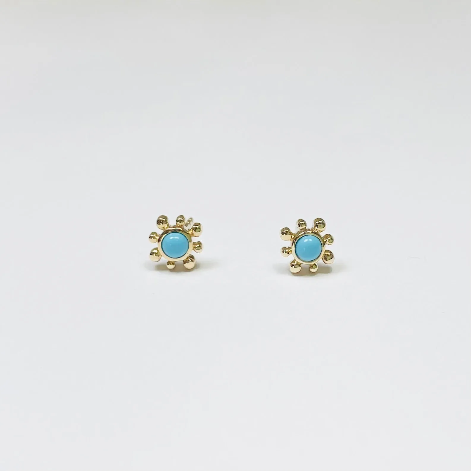 turquoise sun studs sold by Theodosia