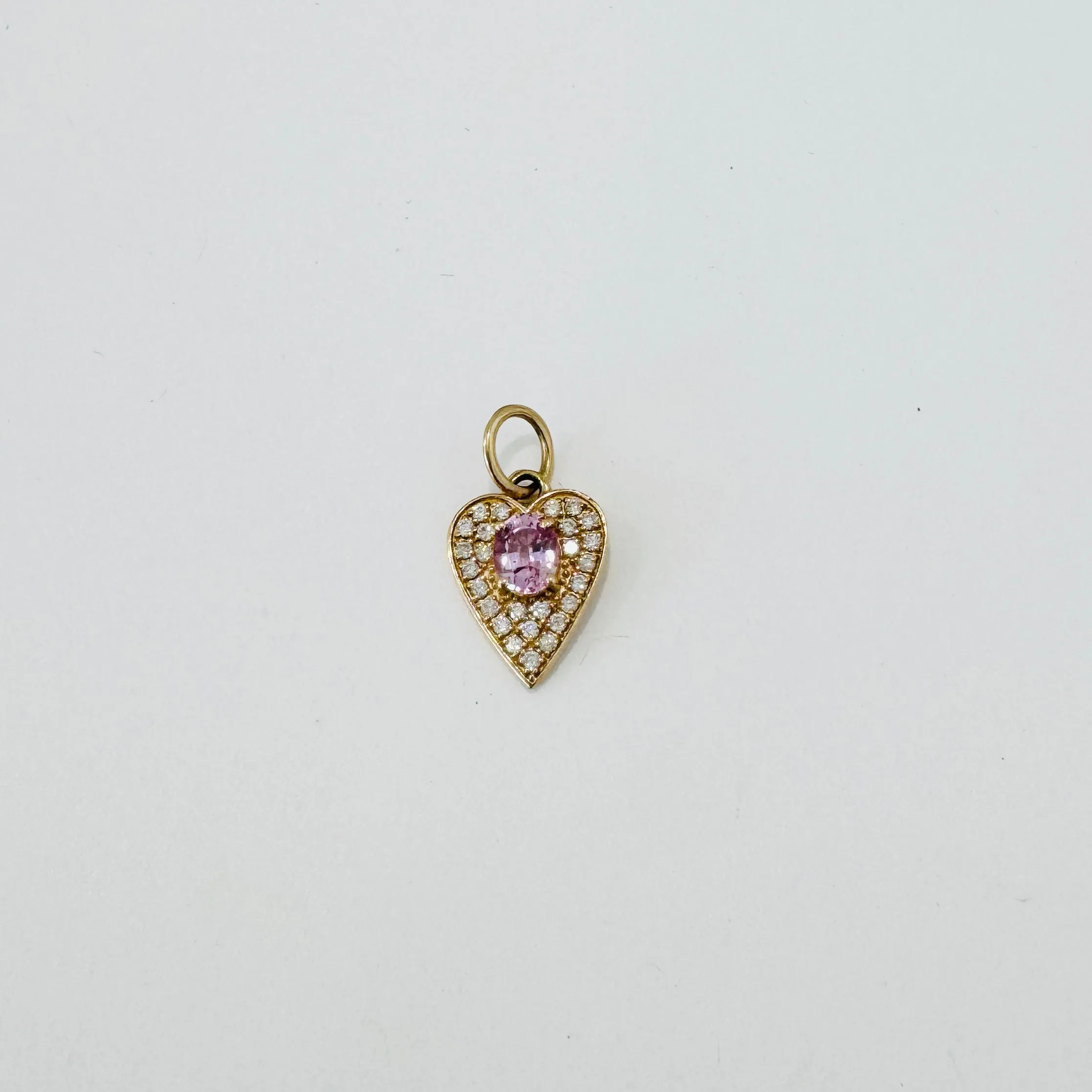 pink sapphire and diamond heart pendant sold by Theodosia