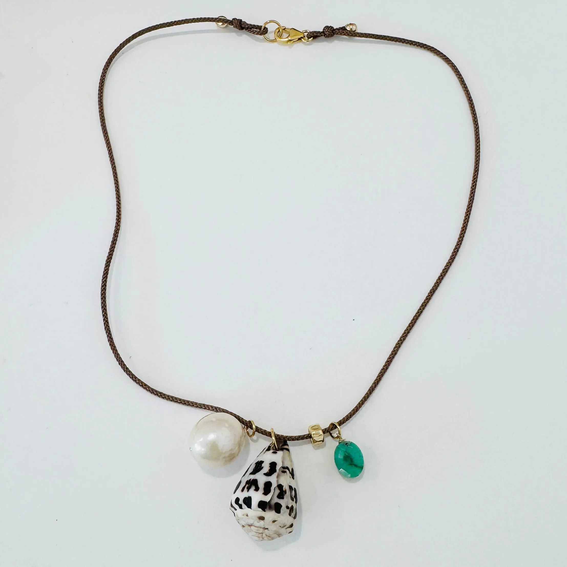 Kumihimo silk cord charm necklace, herringbone with pearl, turquoise, and shell charm sold by Theodosia