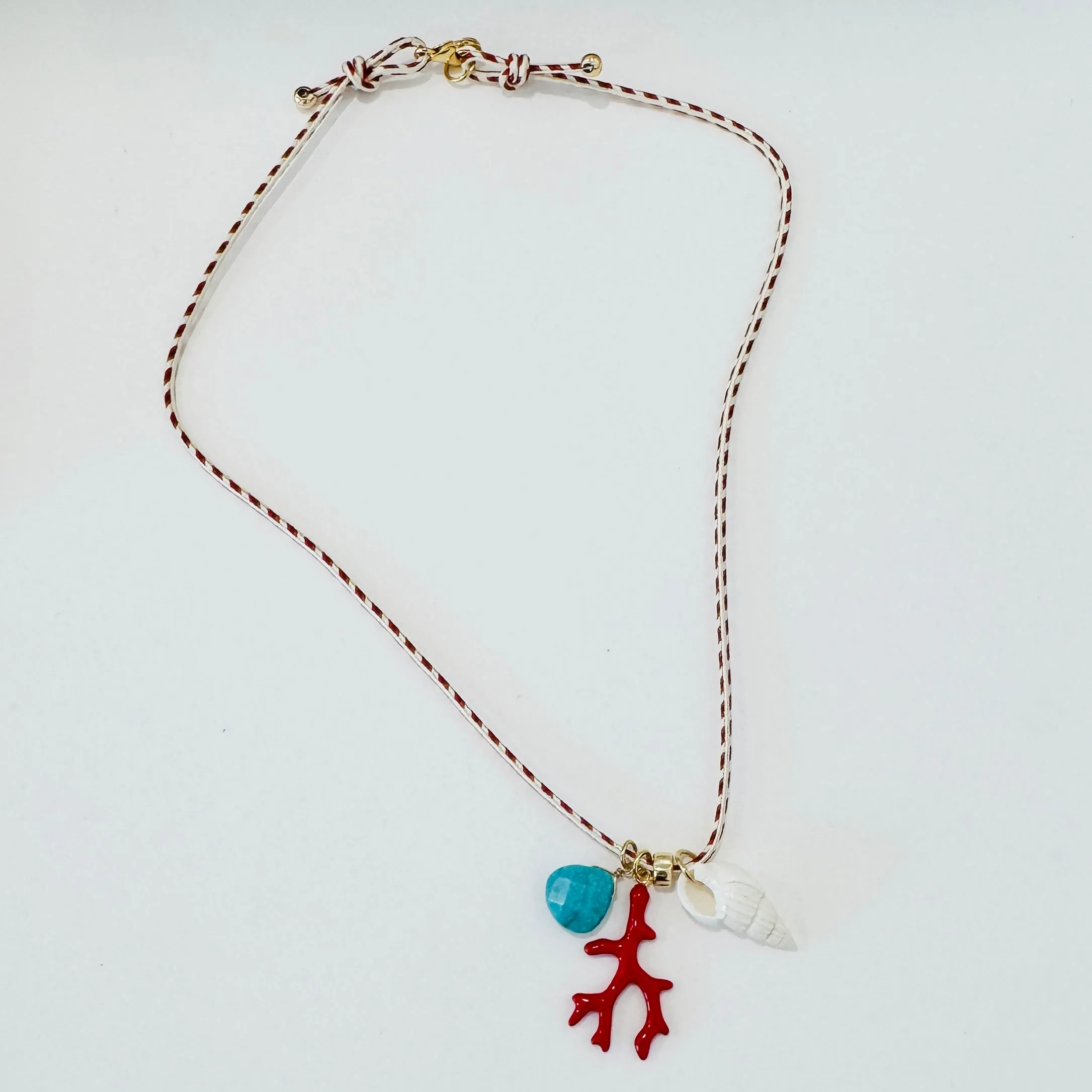 Kumihimo silk cord charm necklace, herringbone with enamel coral, turquoise, and shell charm sold by Theodosia
