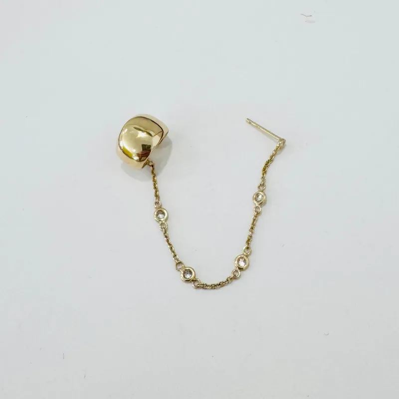 gold ear cuff with chain piercing made by Theodosia