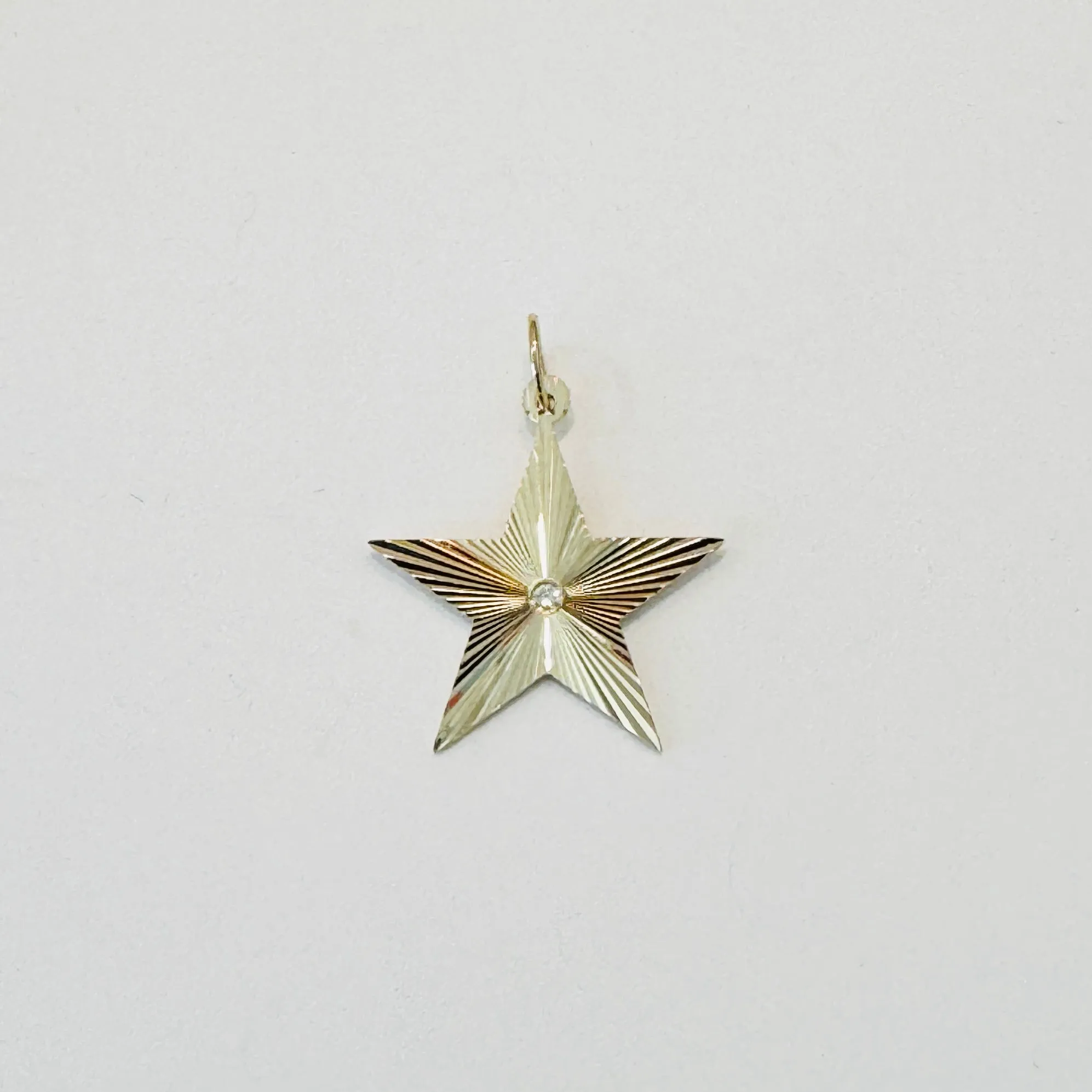 fluted star pendant sold by Theodosia