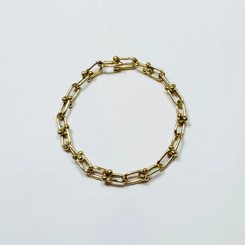 gold horse bit bracelet made by Theodosia