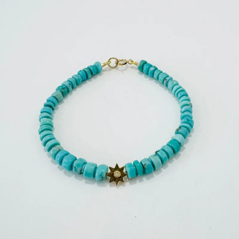 sleeping beauty turquoise bracelet with 14 kt gold starburst made by Theodosia