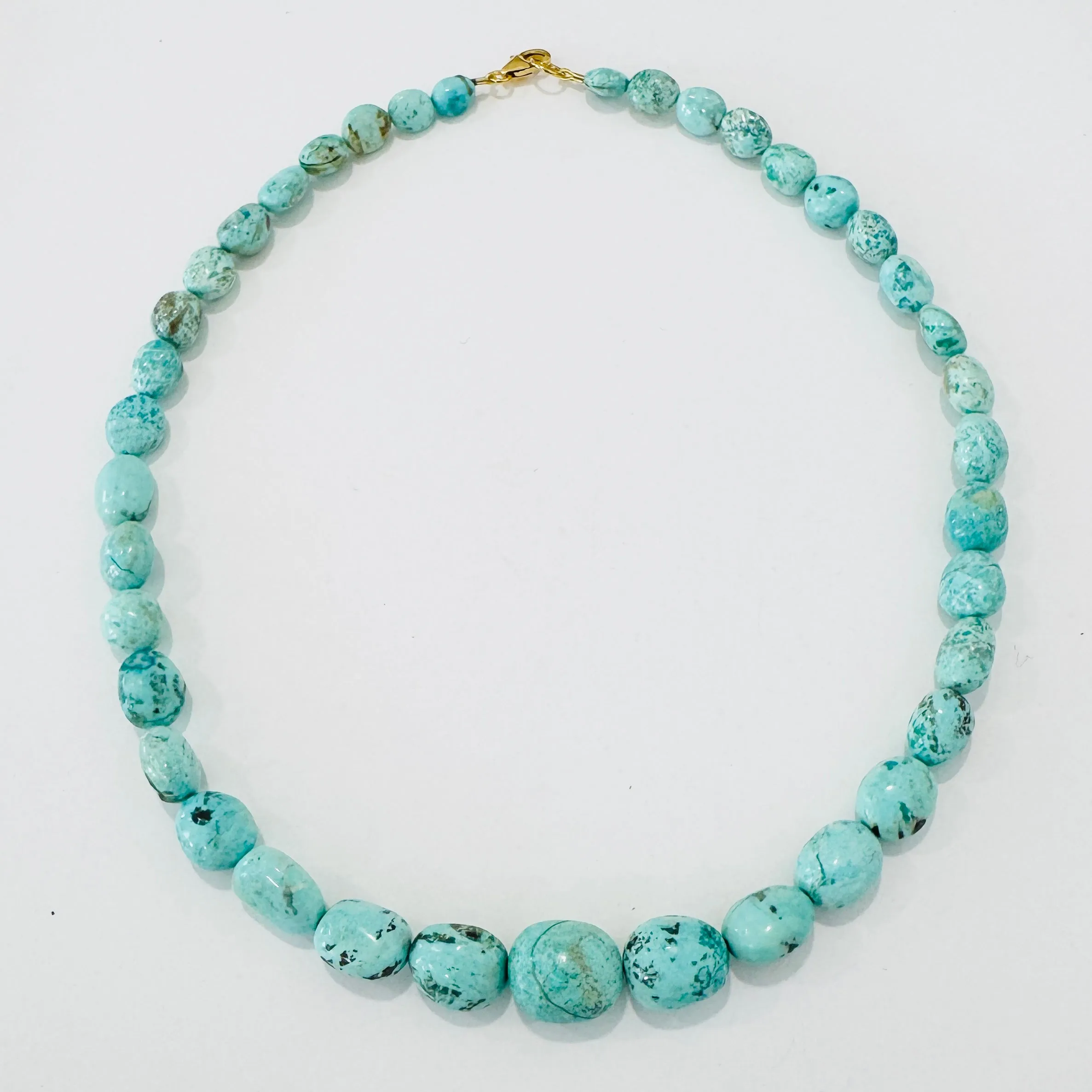 graduated turquoise nugget necklace sold by Theodosia