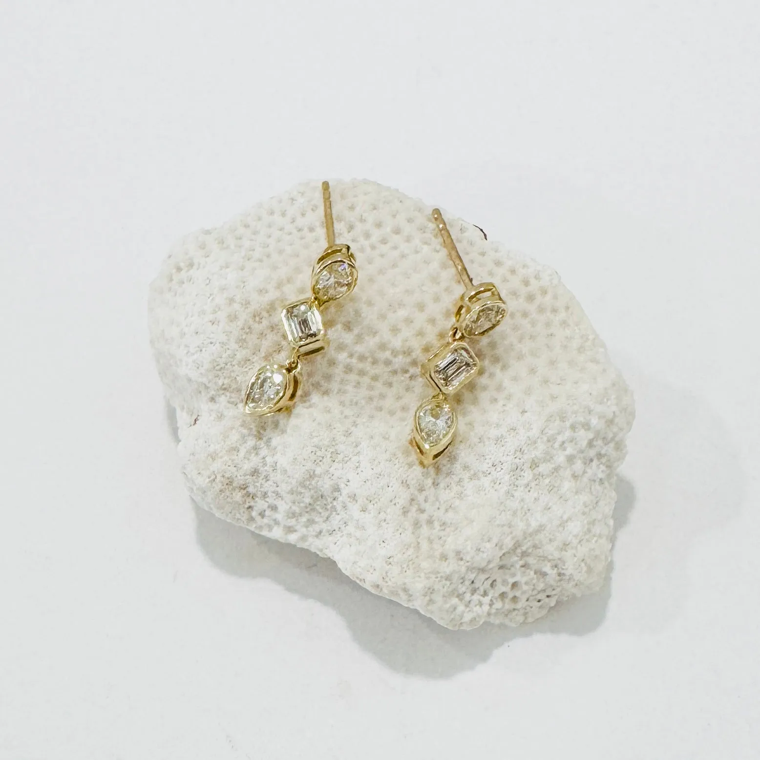 oval, emerald, teardrop diamond earrings sold by Theodosia