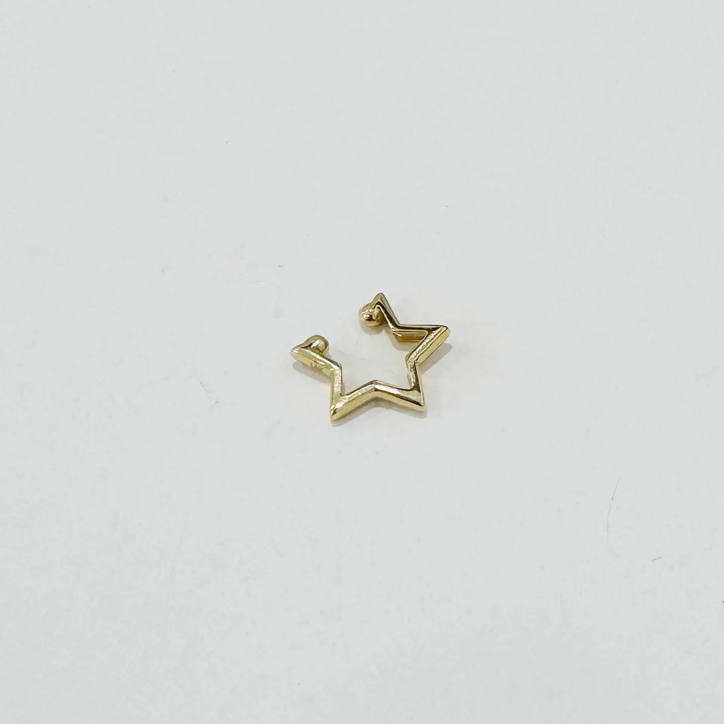 star gold ear cuff sold by Theodosia