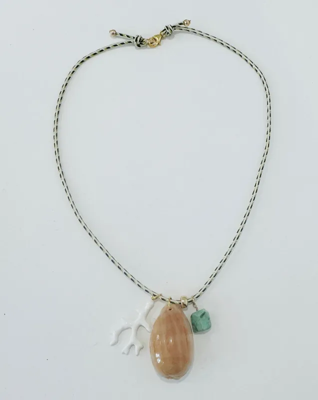 Kumihimo silk cord charm necklace, green herringbone with turquoise, white coral, and tan cowrie shell made by Theodosia