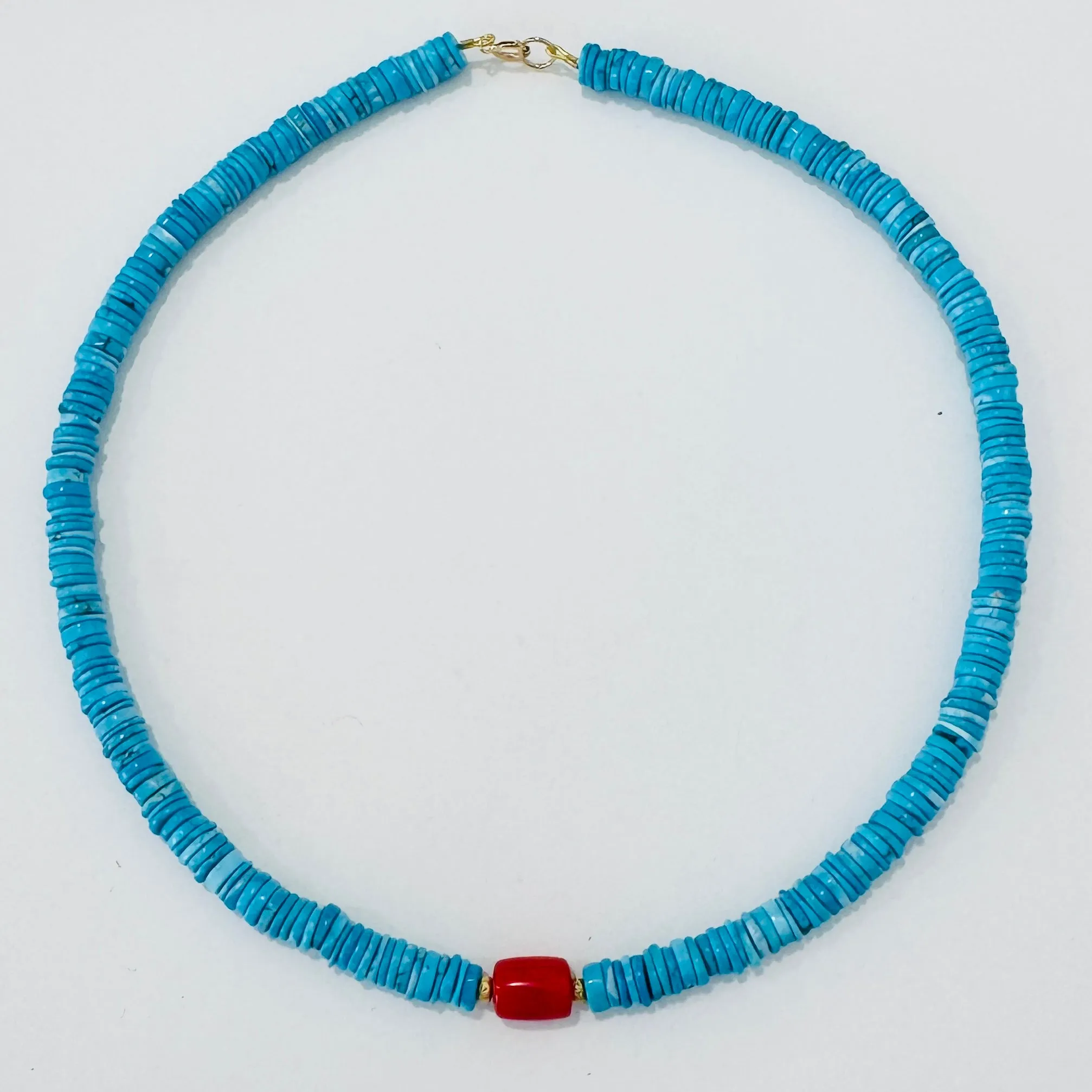 turquoise, coral, and gold beads sold by Theodosia